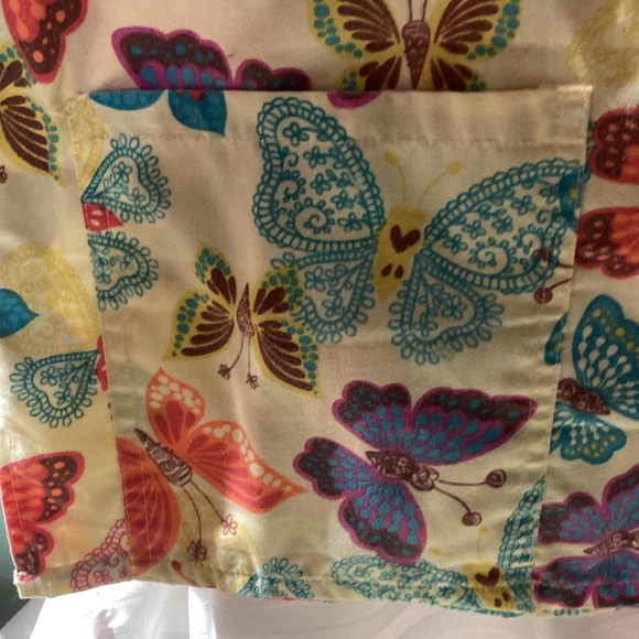 Ladies gently used butterfly scrub top - Picture 2 of 7